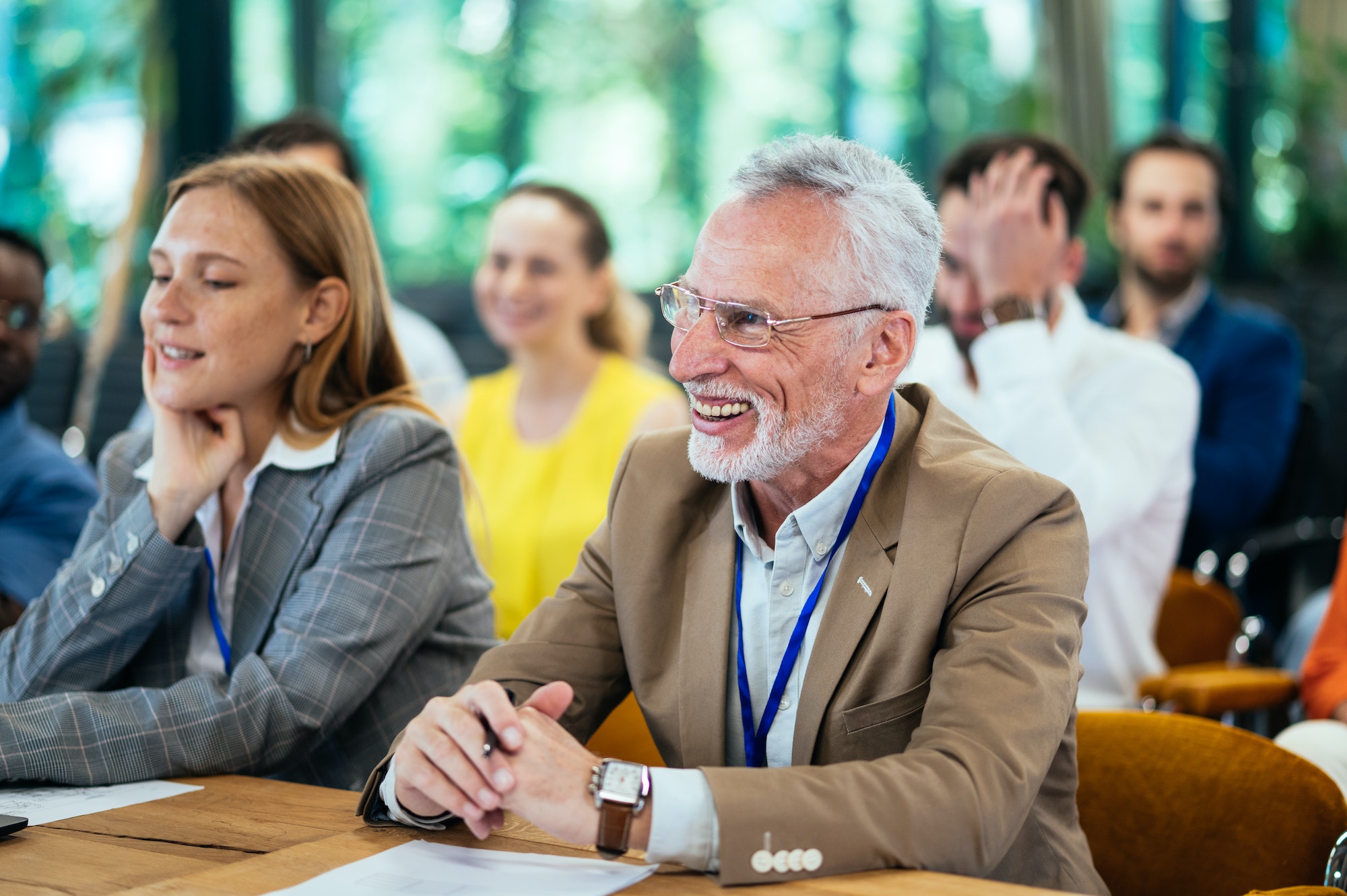 Cinematic image of a conference meeting.